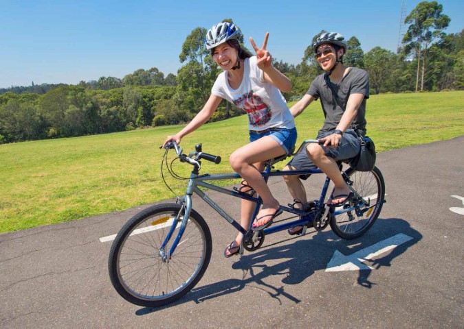 two people cycling