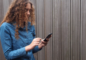Woman looking at mobile phone