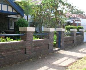 Masonry pier and panel fences