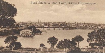 Sisters Bay with a view of boat sheds and Iron Cove Bridge. Circa 1930