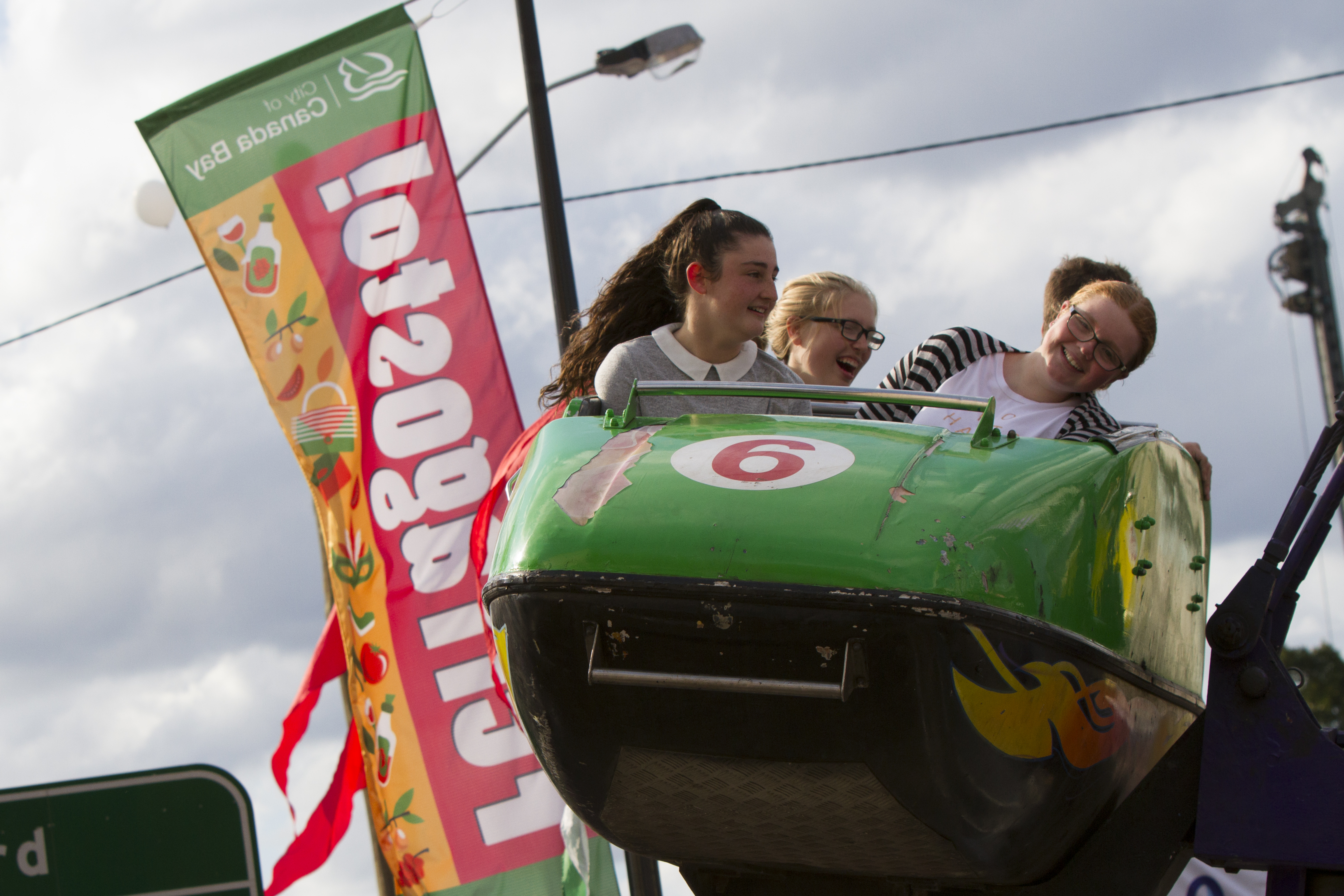 amusement ride with ferra flag back