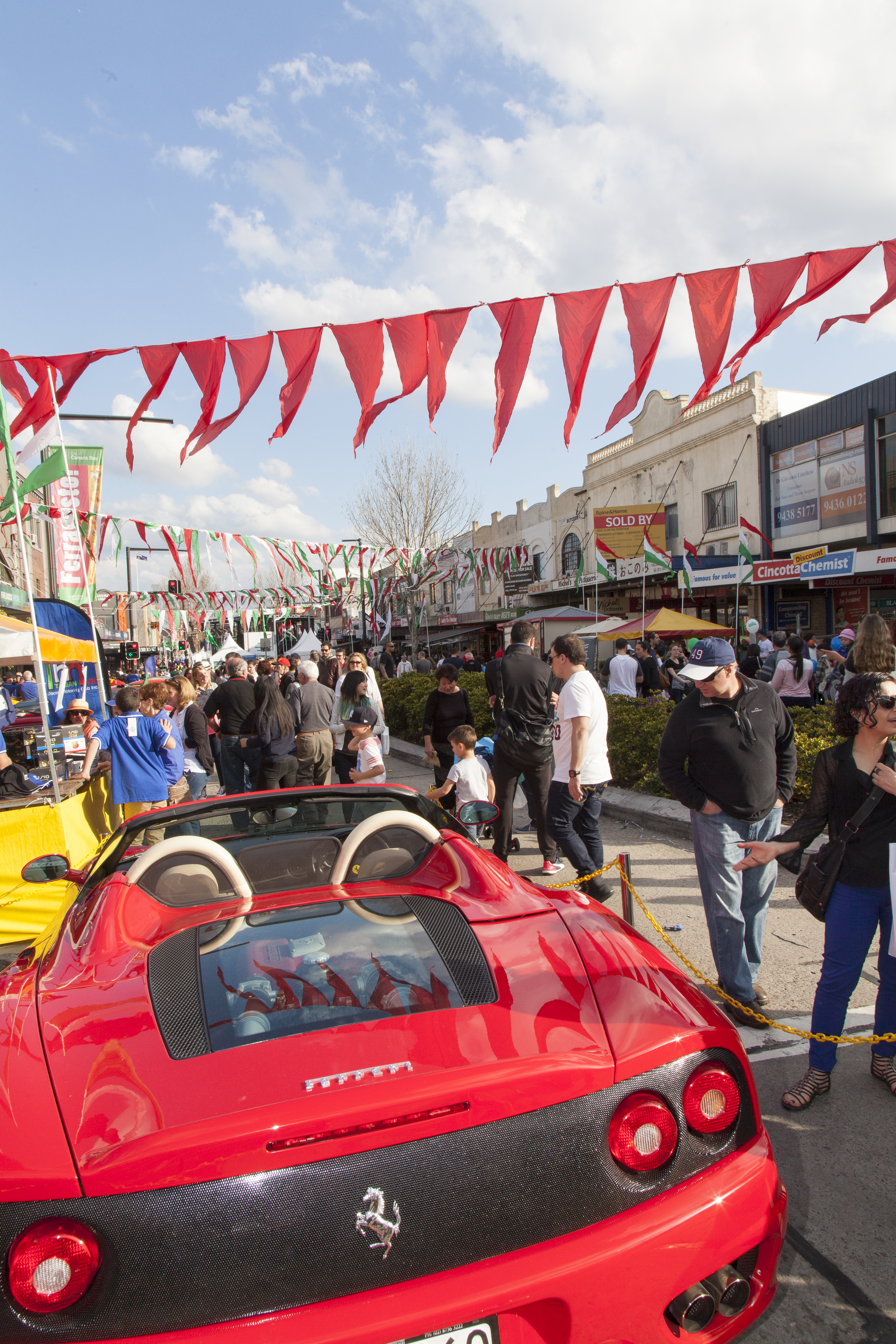crowd and car