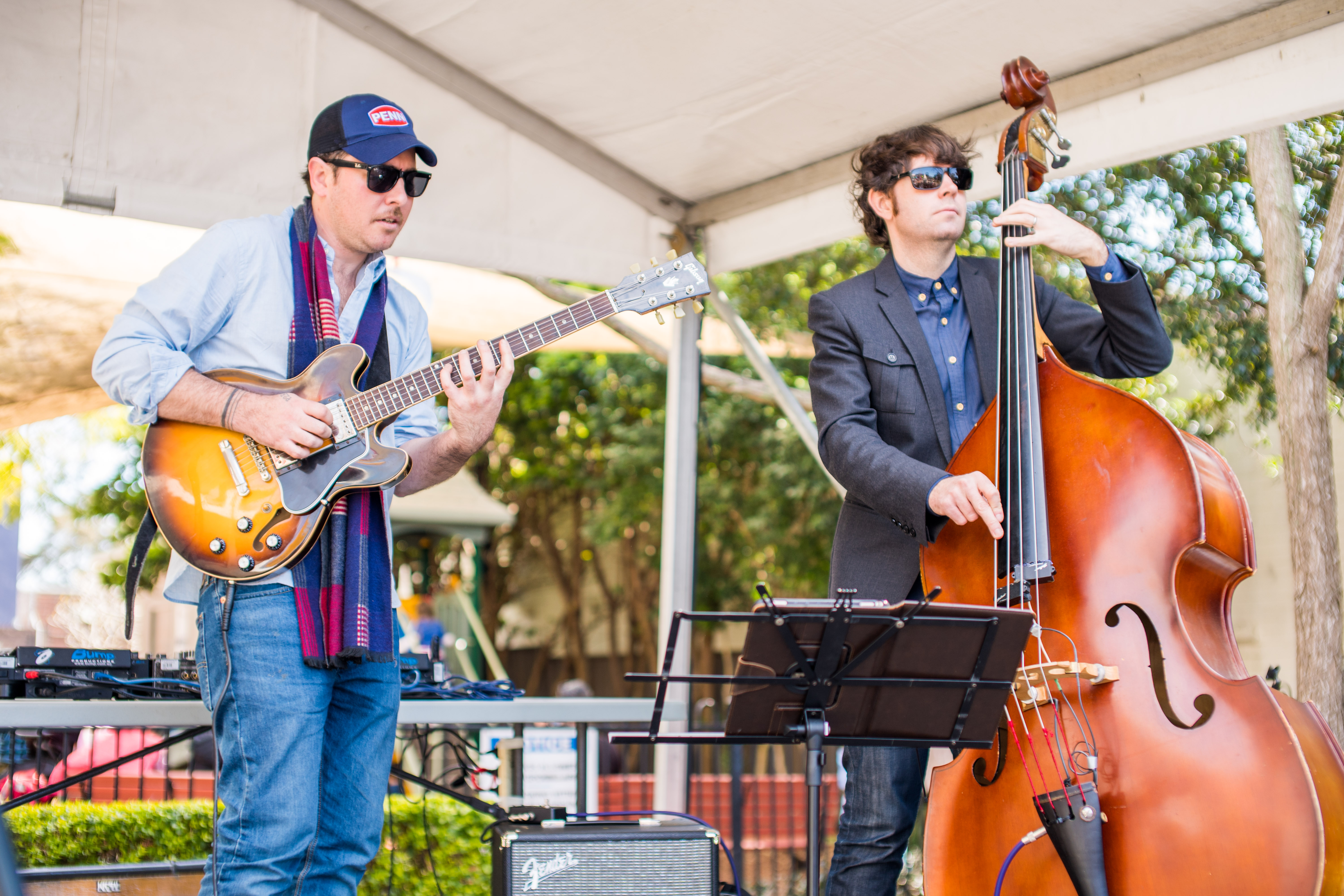 men playing instruments on stage