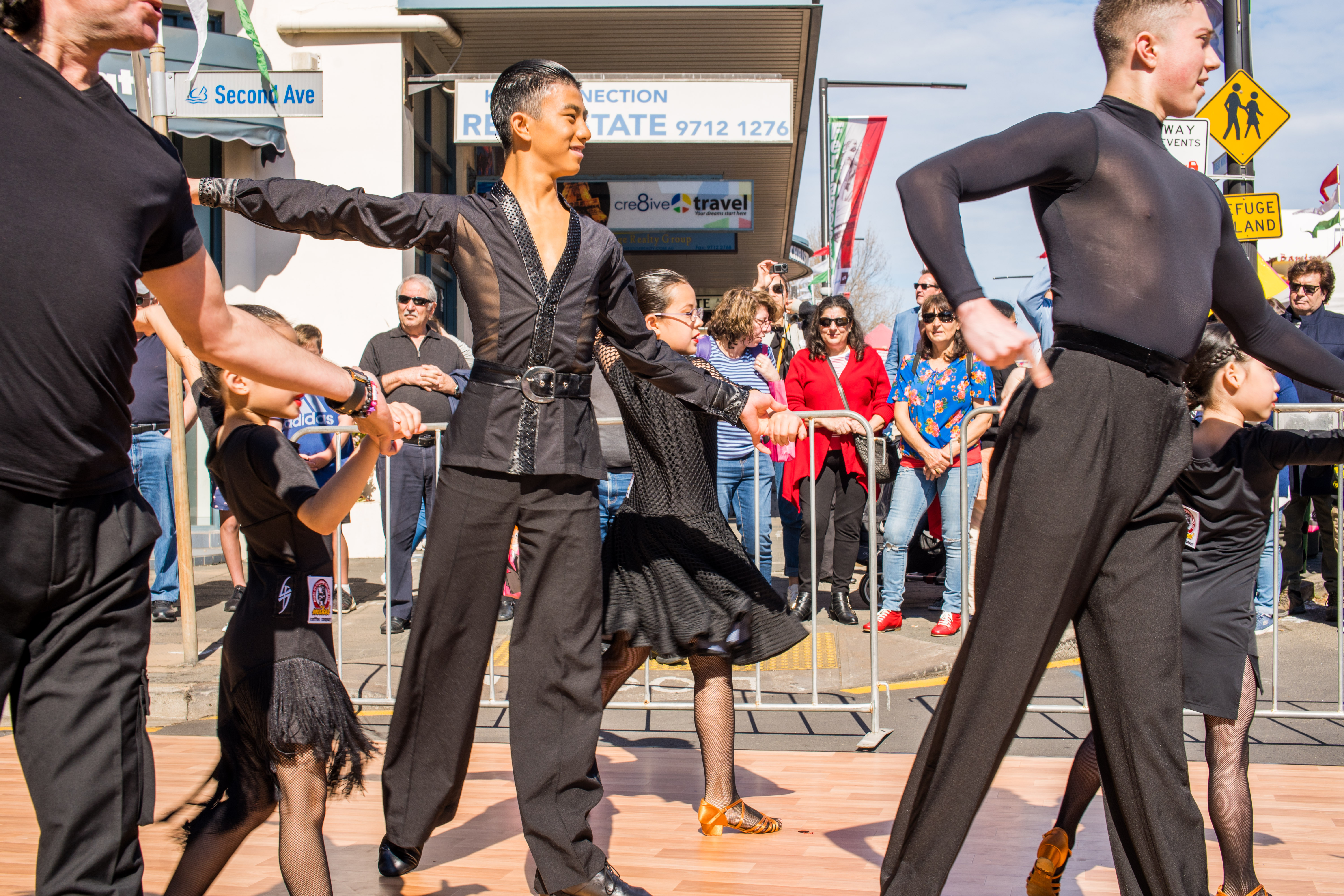 people dancing on street