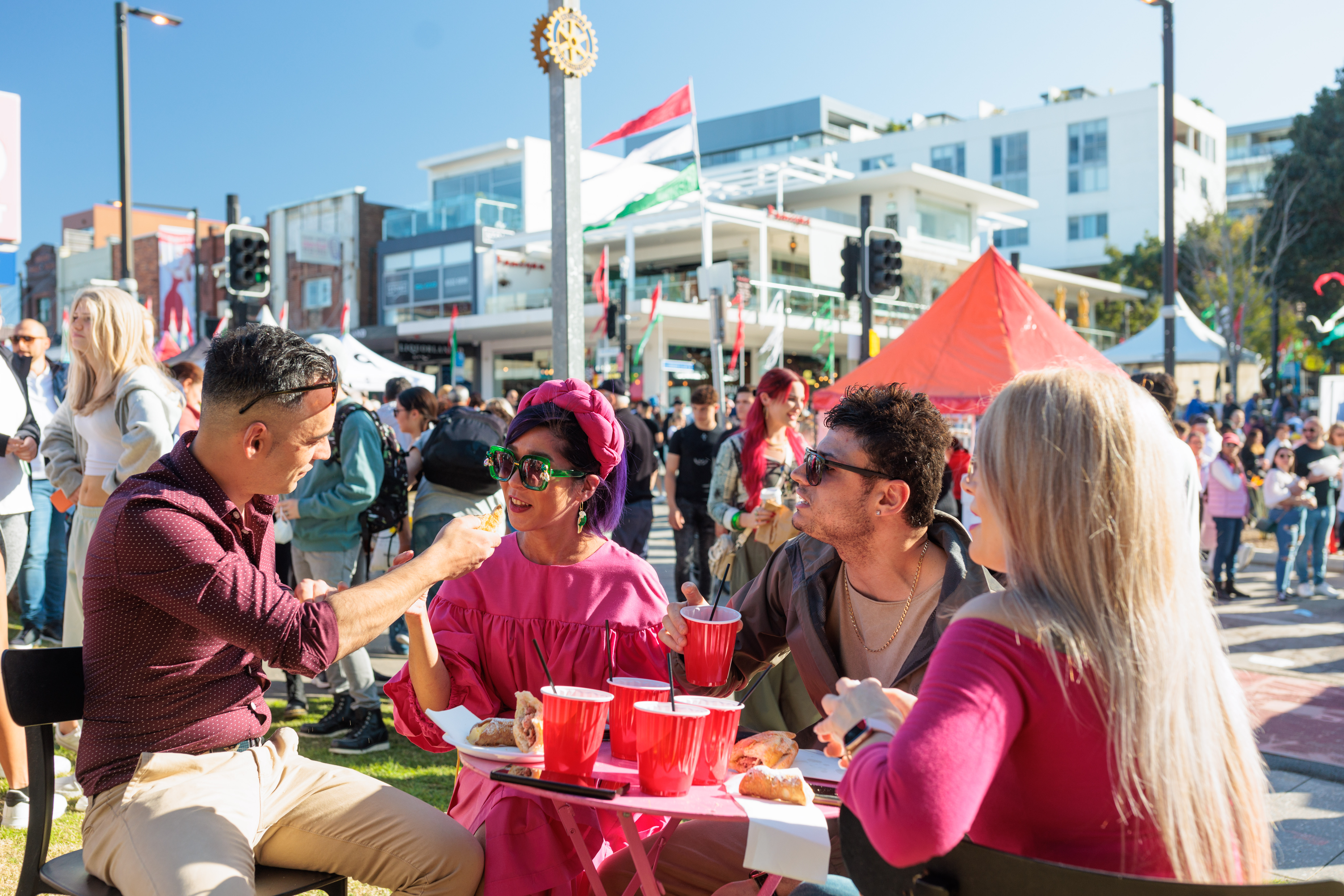 people seating down and eating food