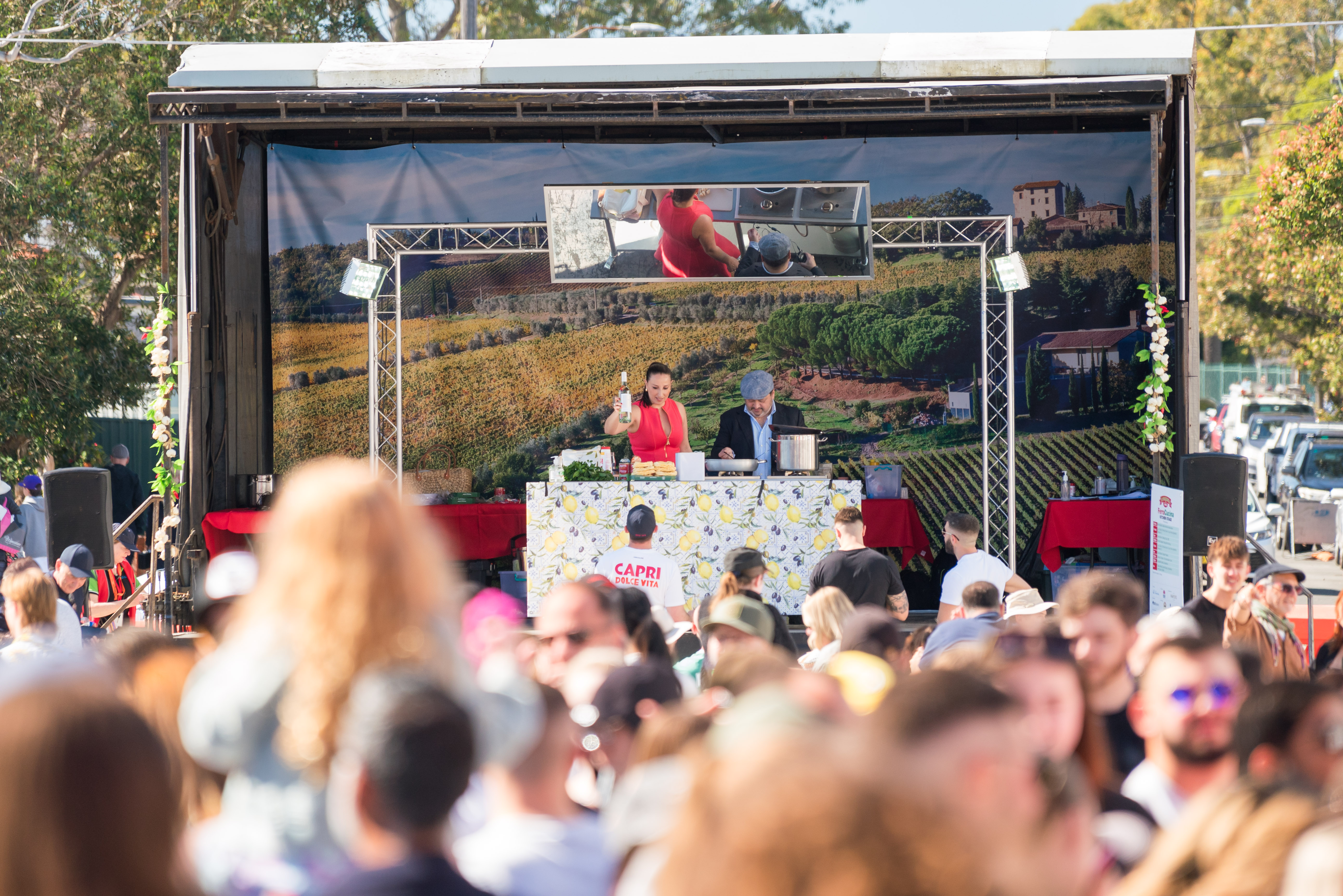 zoom out of kitchen stage with chef and mc
