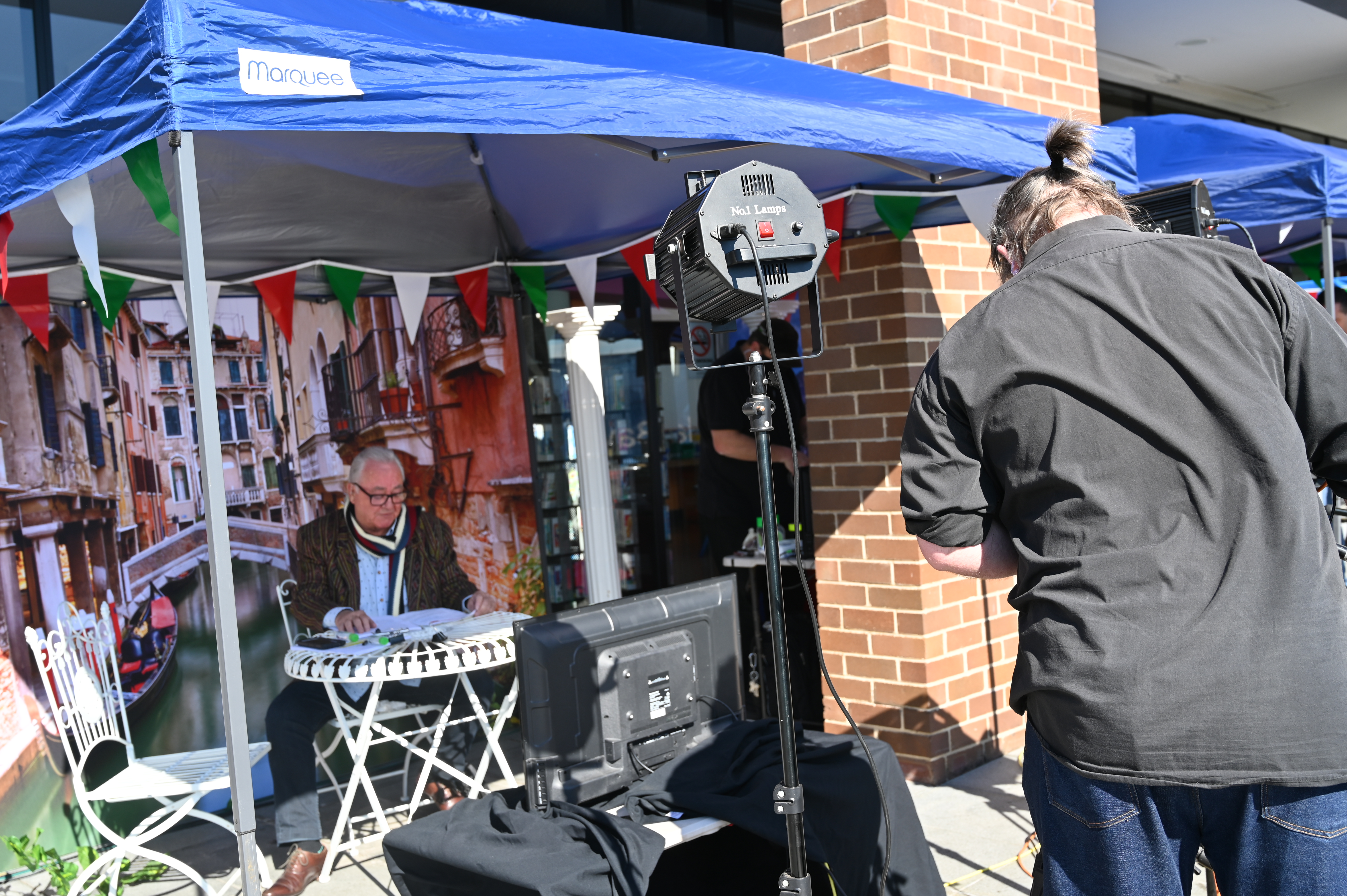 camera man broadcasting person