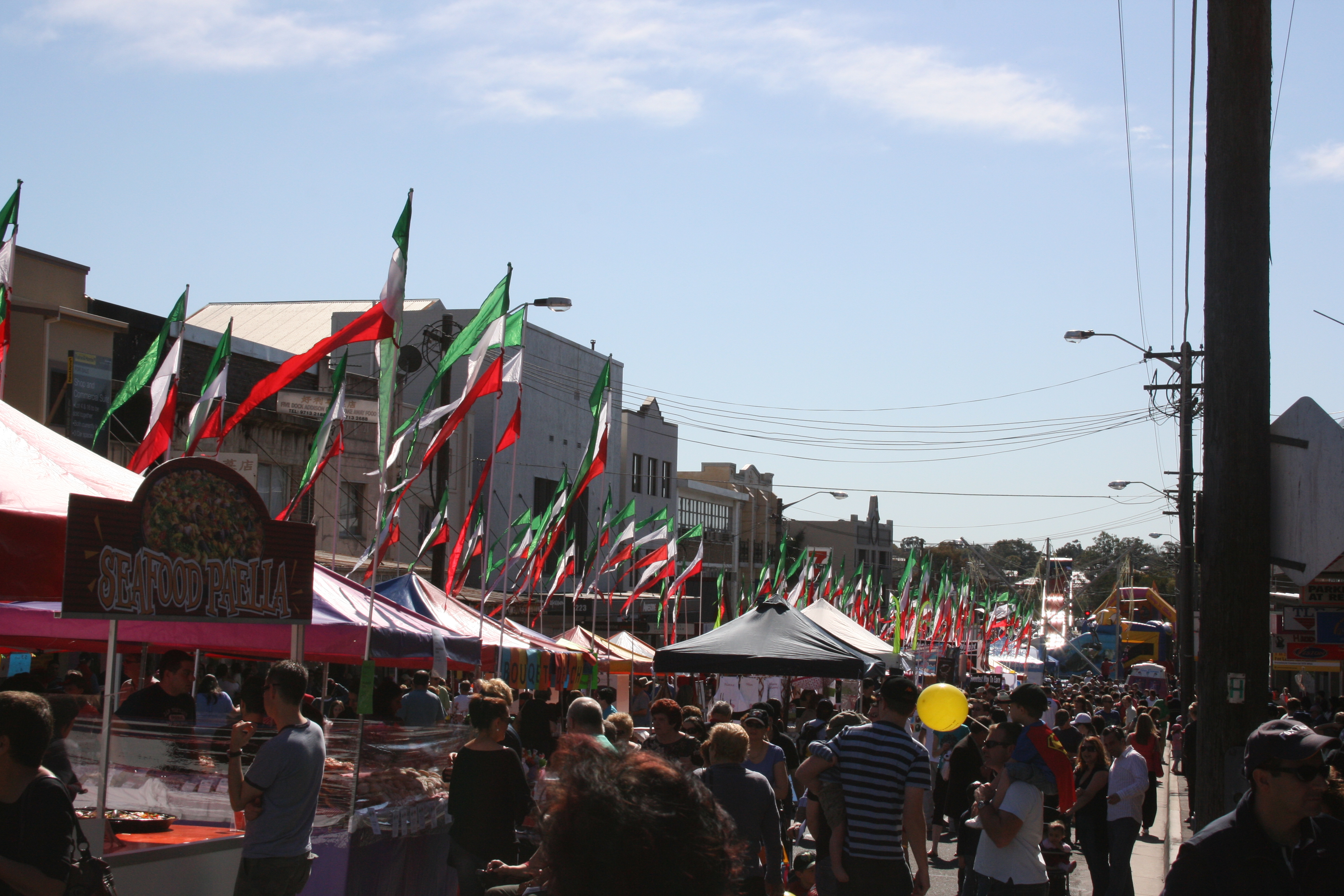 crowd of people and stalls at ferra