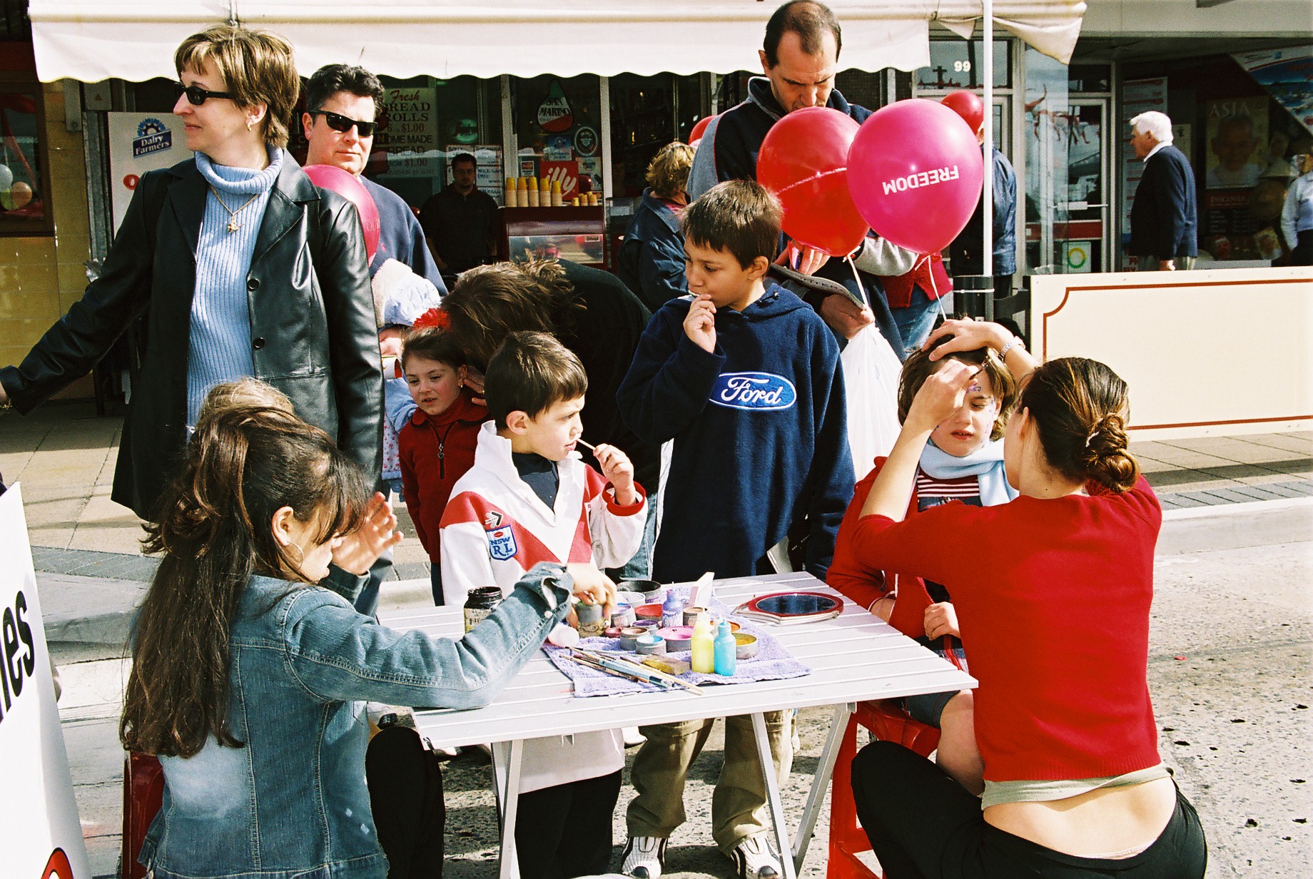 kids getting their face painted