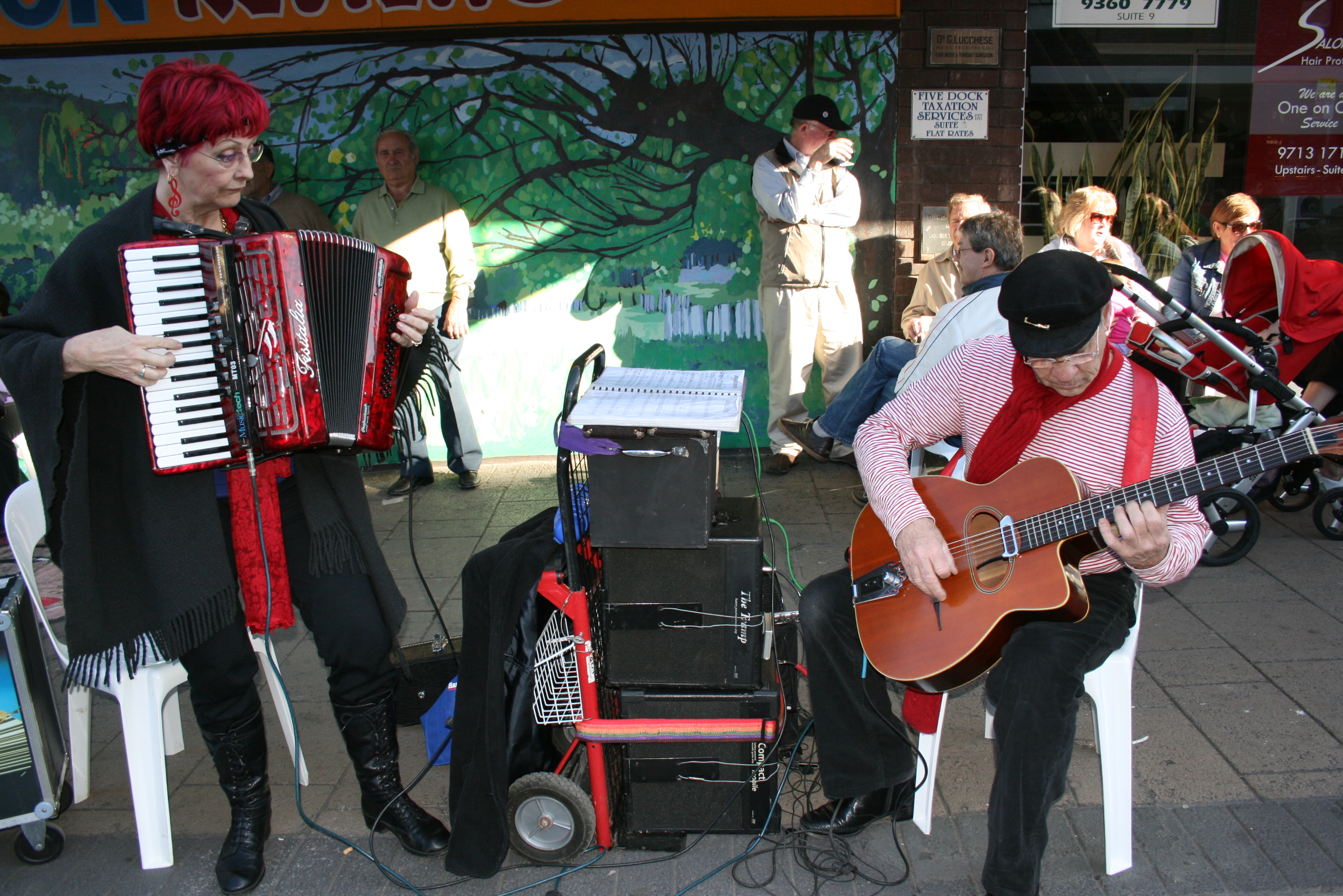 people playing instruments at ferra