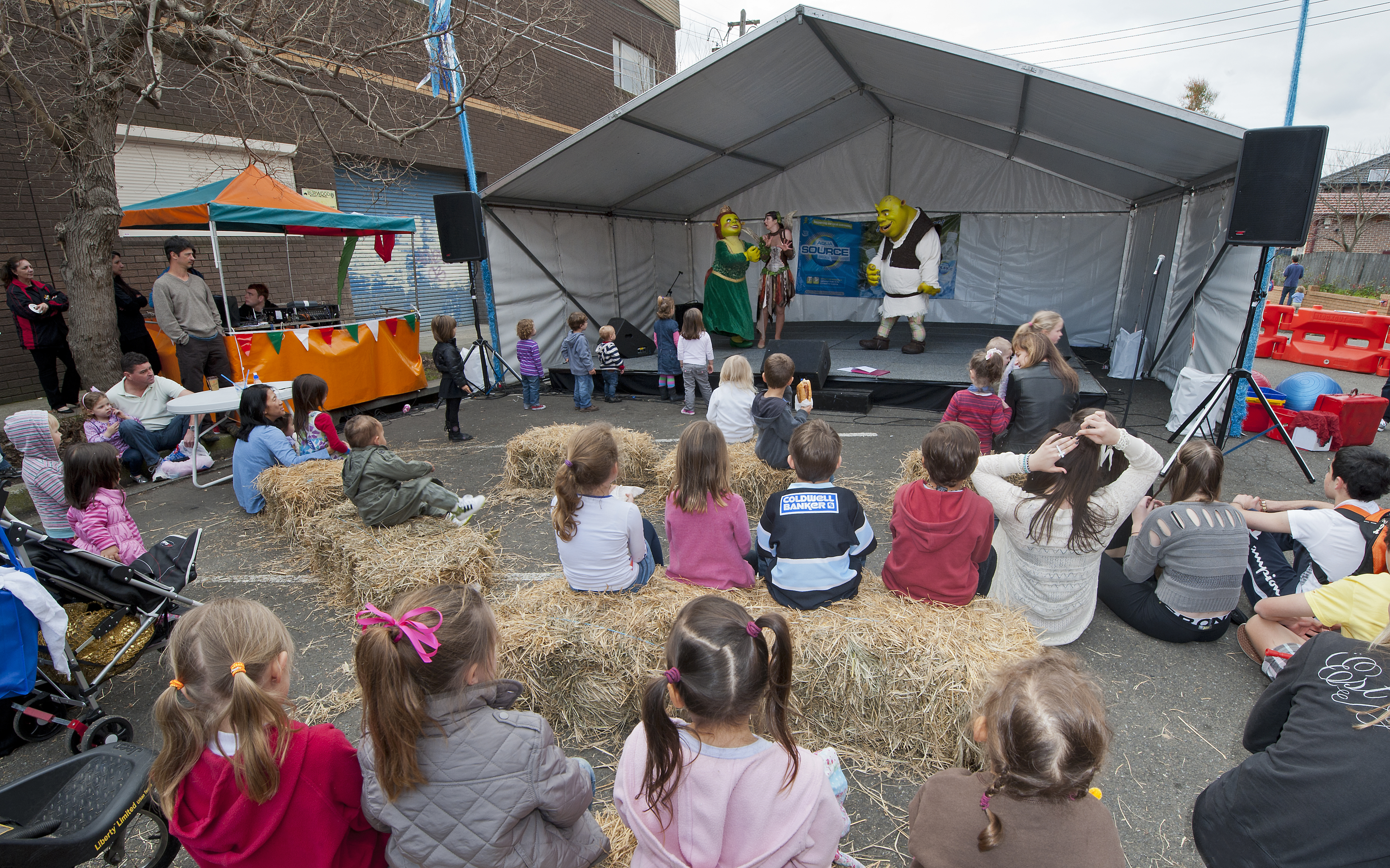 kids watching shrek on stage