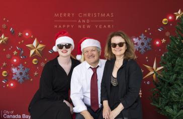christmas carollers posing for a photo
