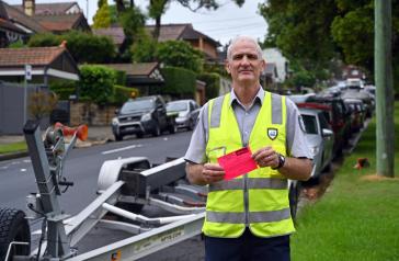 Image of Council ranger with pink slip