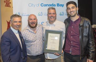 Mayor Angelo Tsirekas with representatives from Akasha Brewing Company at the 2018 Sustainability Awards