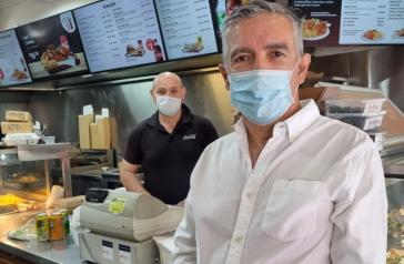 City of Canada Bay Mayor Angelo Tsirekas with Simon Yacoub at Caribbean Charcoal Chicken & Burgers in Concord.
