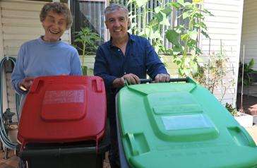 Coral Arnold and Mayor Angelo Tsirekas with bins labelled using braille bin labels