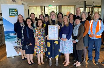Council staff accepting award