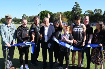 City of Canada Bay Mayor Angelo Tsirekas with local sporting group representatives cutting the ribbon to officially open the upgraded facility