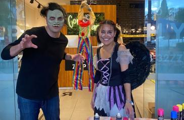 Man and women in Halloween costumes