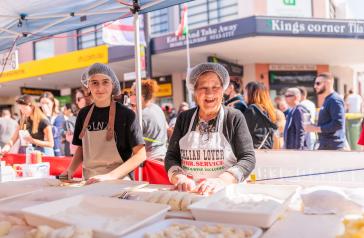 Two people making gnocchi at Ferragosto.